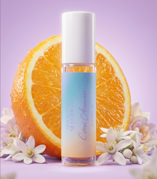 Citrus Aromatic 10 milliliter perfume oil bottle.  An sliced orange with flowers as photo props on a light purple background. Original Price: $14. Comes in a roll-on glass bottle. Notes are Bergamot, mandarin, petitgrain, orange flower, jasmine, pitosporum and amber. Ingredients are Prunus Armeniaca (Apricot) Kernel Oil, Fragrance, Polycitronellol