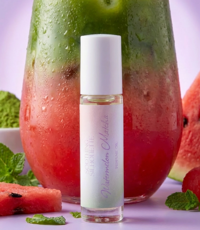 Watermelon Matcha 10 milliliter perfume oil bottle. Large watermelon matcha drink with watermelon and matcha powder as photo props on a light purple background. Original Price: $14. Comes in a roll-on glass bottle. Notes are chamomile, green tea leaves, wild violet and watermelon.
Ingredient are Isopropyl Myristate and Fragrance